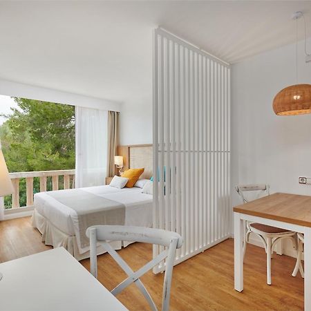 Hotel Apartamentos Cala Сантаньи Экстерьер фото