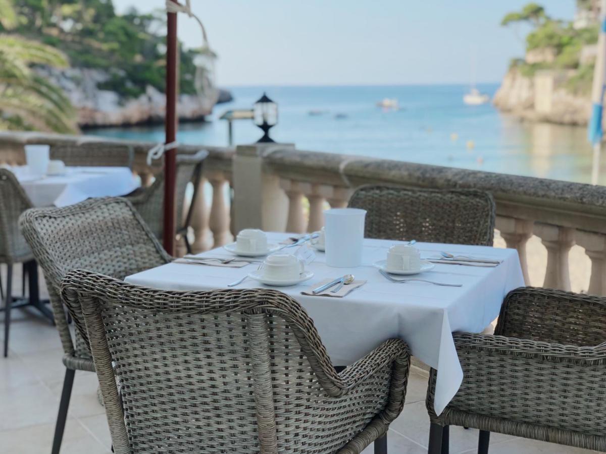 Hotel Apartamentos Cala Сантаньи Экстерьер фото