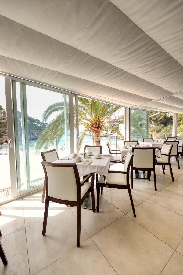 Hotel Apartamentos Cala Сантаньи Экстерьер фото