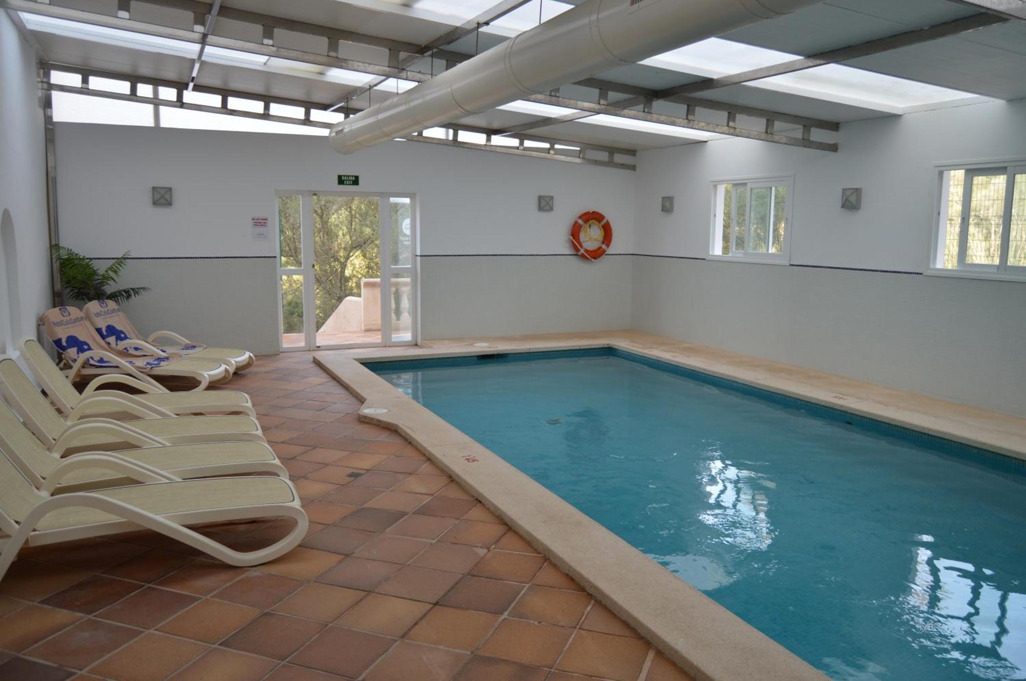 Hotel Apartamentos Cala Сантаньи Экстерьер фото