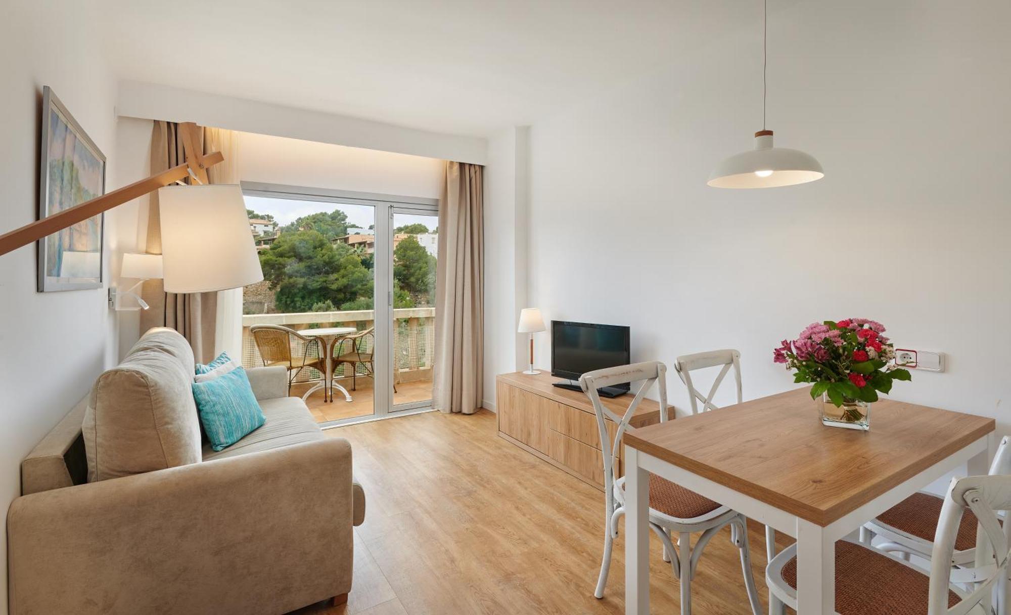 Hotel Apartamentos Cala Сантаньи Экстерьер фото