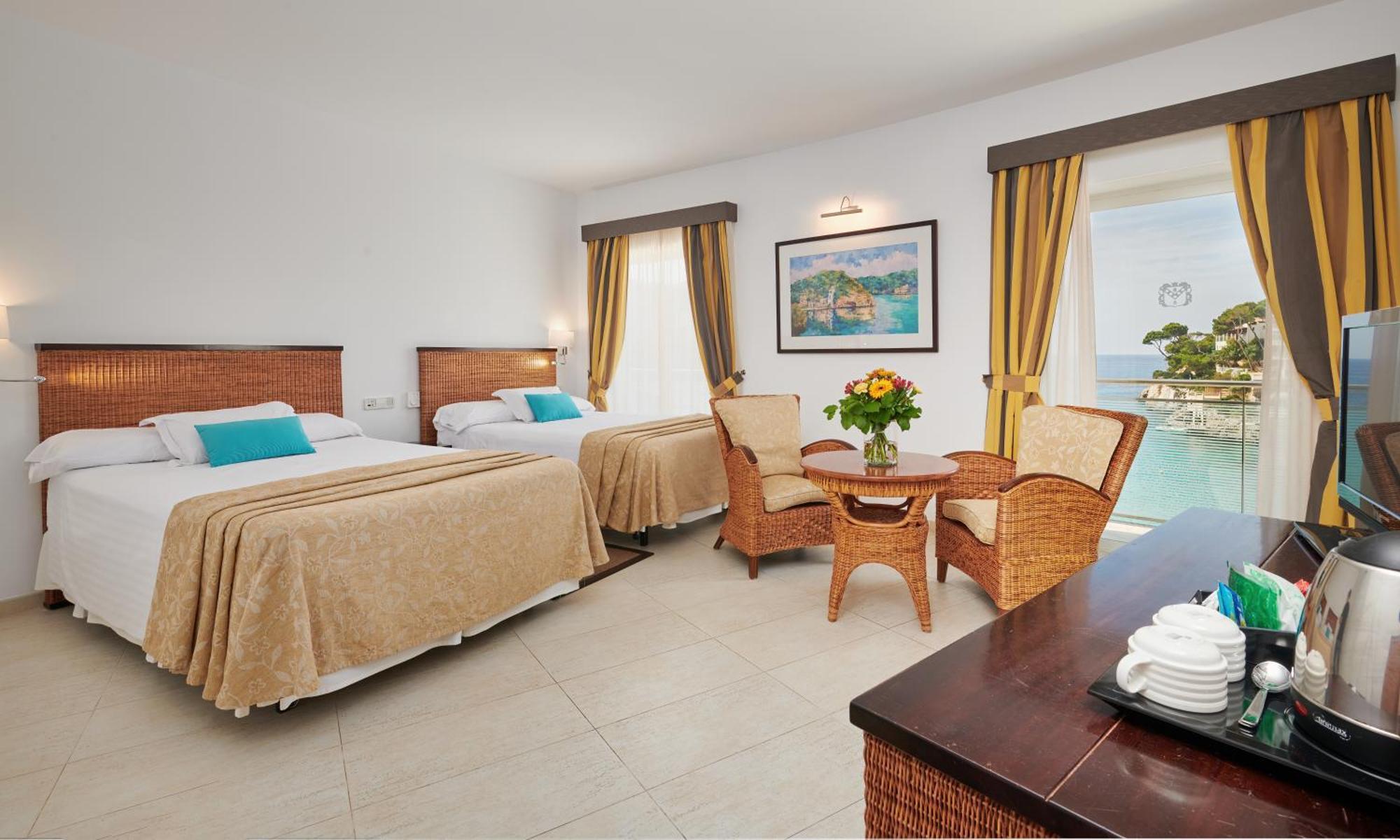 Hotel Apartamentos Cala Сантаньи Экстерьер фото