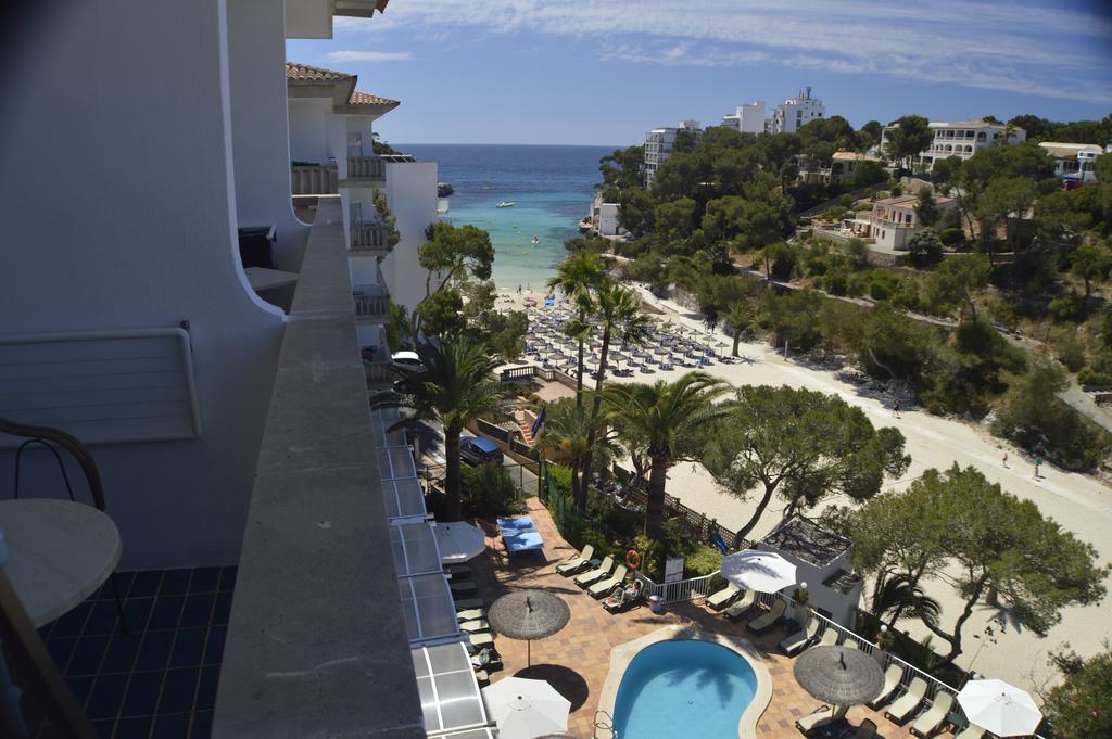 Hotel Apartamentos Cala Сантаньи Экстерьер фото