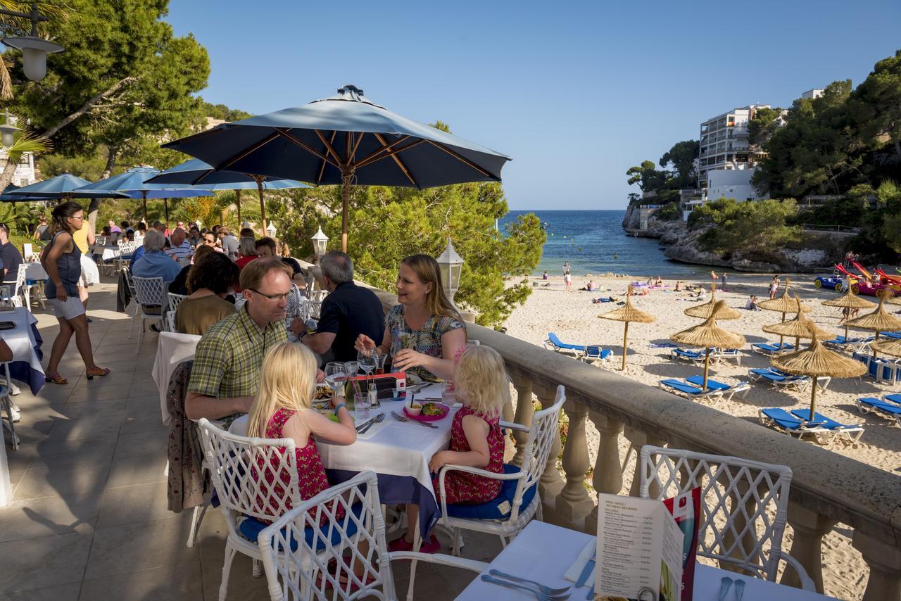 Hotel Apartamentos Cala Сантаньи Экстерьер фото