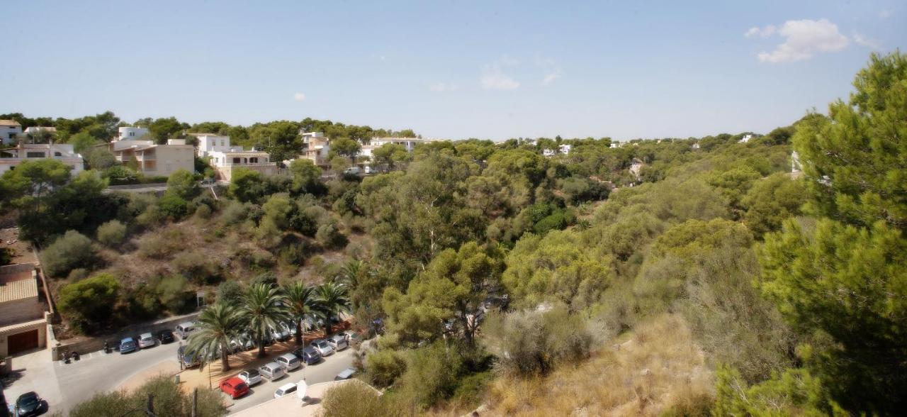 Hotel Apartamentos Cala Сантаньи Экстерьер фото