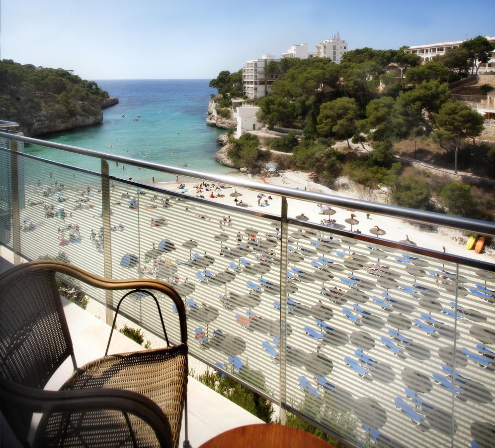 Hotel Apartamentos Cala Сантаньи Экстерьер фото